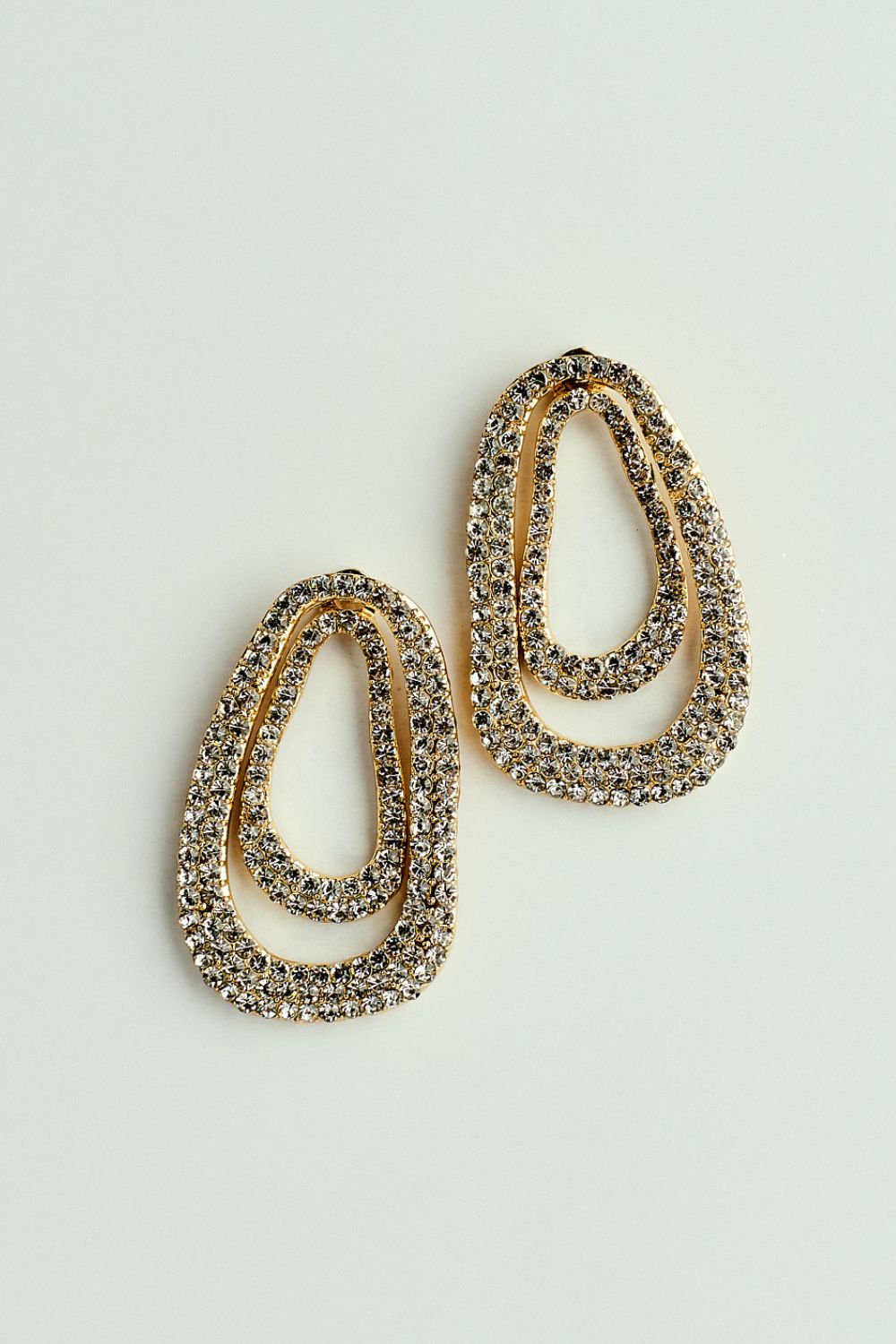 Brinco Oval Duo Orgânico com Strass Dourado