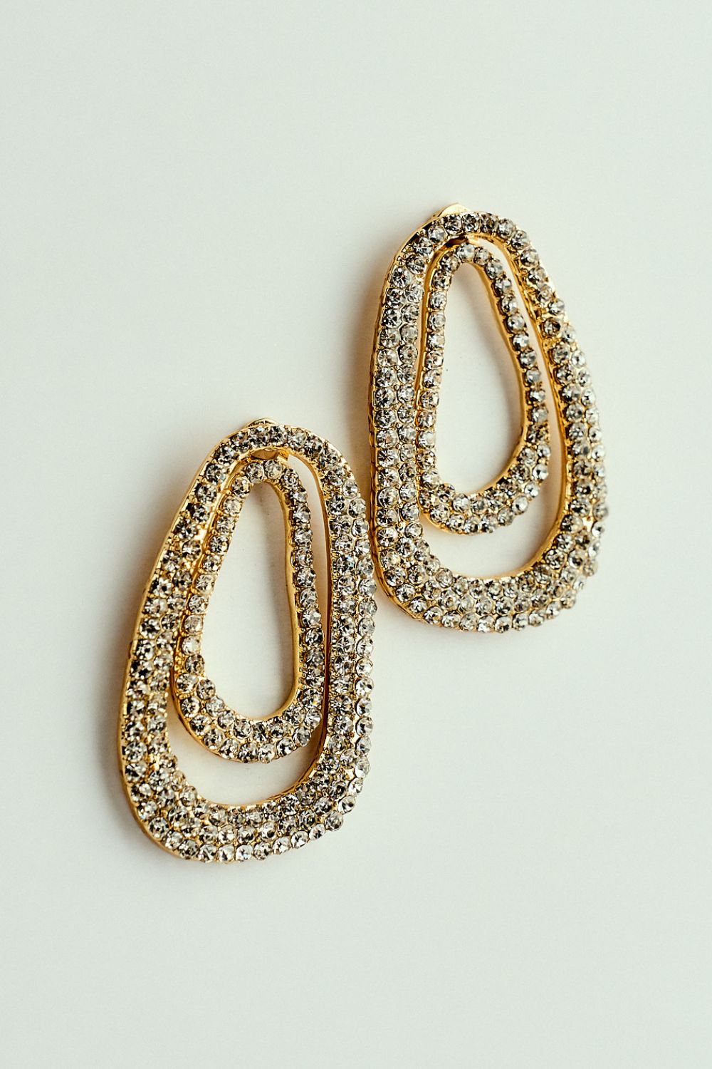 Brinco Oval Duo Orgânico com Strass Dourado
