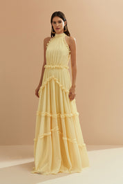 Vestido Longo em Chiffon com Gola Alta, Franzido com Babados na Saia e Abertura nas Costas com Fechamento em Laço - Alvorada Amarelo