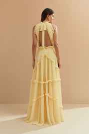 Vestido Longo em Chiffon com Gola Alta, Franzido com Babados na Saia e Abertura nas Costas com Fechamento em Laço - Alvorada Amarelo
