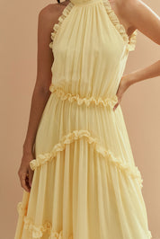 Vestido Longo em Chiffon com Gola Alta, Franzido com Babados na Saia e Abertura nas Costas com Fechamento em Laço - Alvorada Amarelo